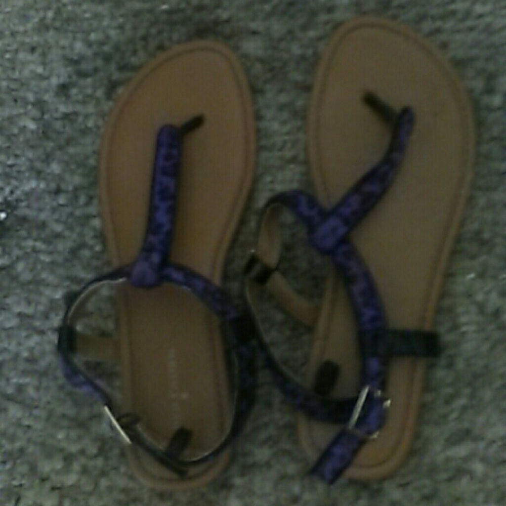 Purple cheetah printed sandels.